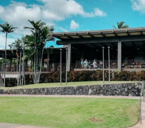 Hero image for Manoli’s Pizza Company contact page showcasing Wailea Maui restaurant ambiance and inviting guest experience.