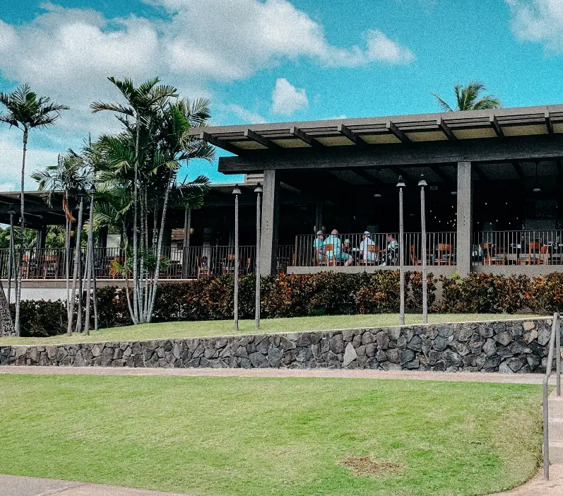 Hero image for Manoli’s Pizza Company contact page showcasing Wailea Maui restaurant ambiance and inviting guest experience.